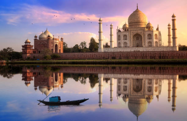 Taj Mahal is a white marble mausoleum on the banks of the Yamuna river built by Mughal Emperor Shah Jahan. A UNESCO World Heritage site at Agra, India. Photograph taken from Mehtab Bagh.